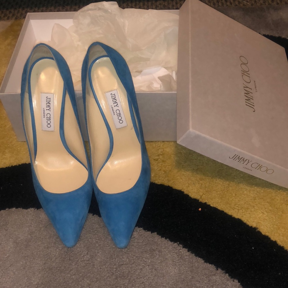Blue suede pumps gently worn